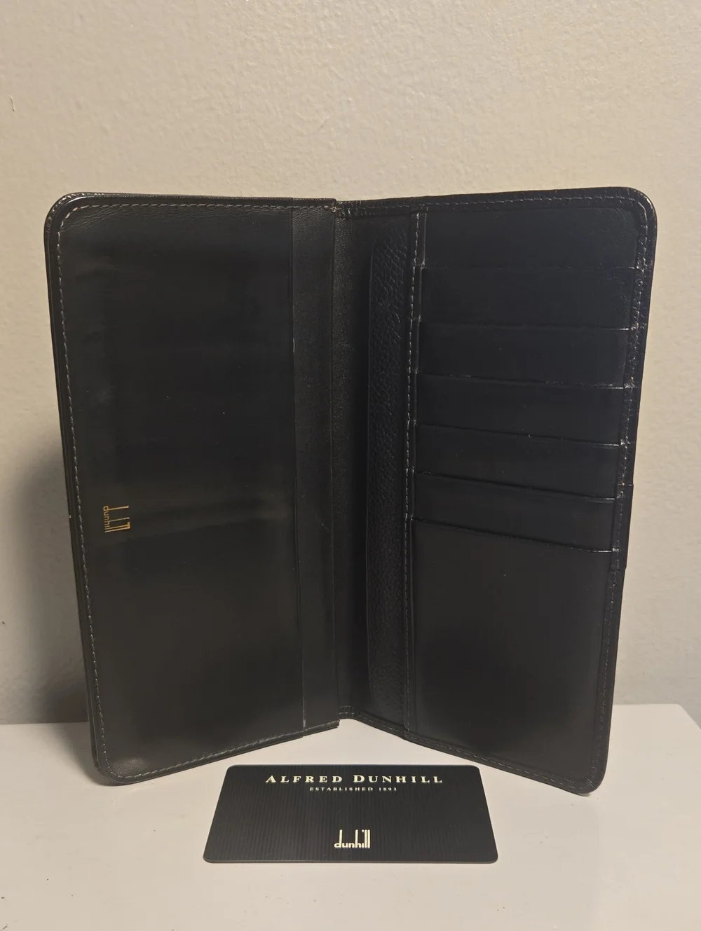 Dunhill Black Pebble Leather Continental Wallet with Gold Accent